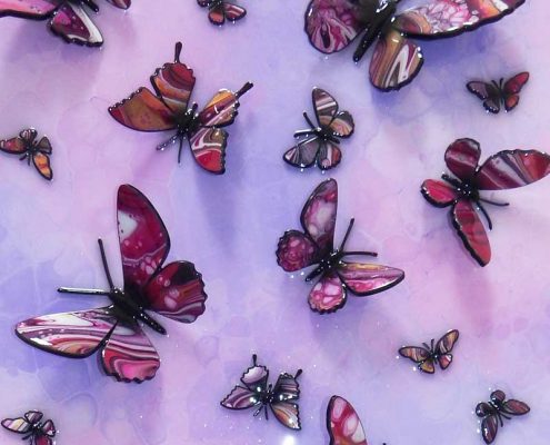 2d butterflies on purple pink background