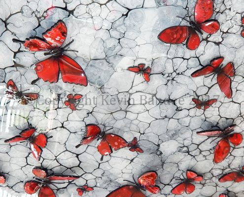 Red butterflies on mono background