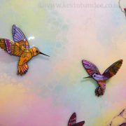yellow purple hummingbirds